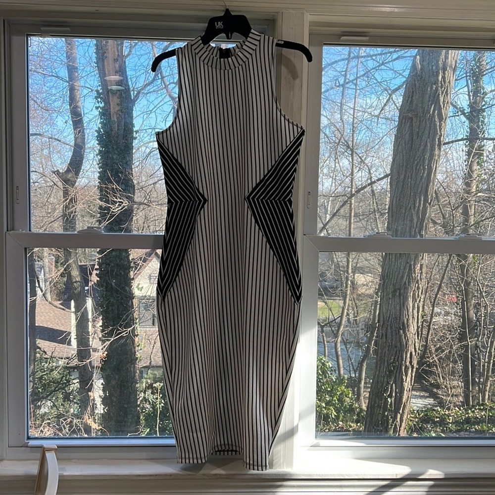 Black and white mock neck midi length stripe dress